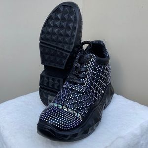 Bedazzled black tennis shoe